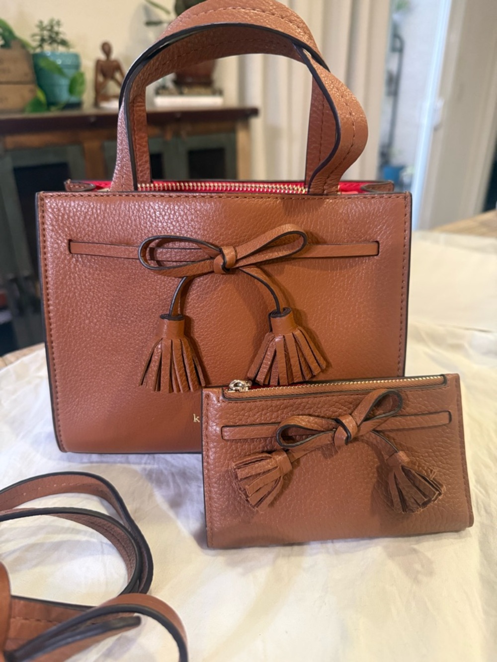 kate spade brown leather satchel with tassel bow